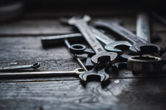 Group of wrenches on wood
