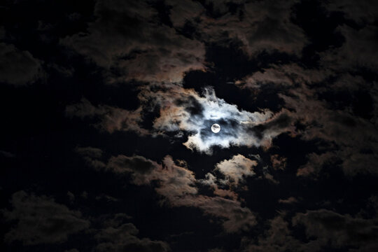 Full moon at cloudy night