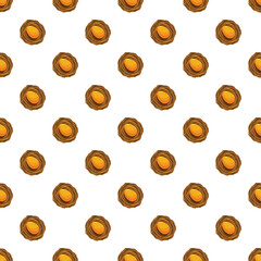 Obraz premium Golden eggs resting in bird nests as a seamless pattern symbolizing wealth and investment