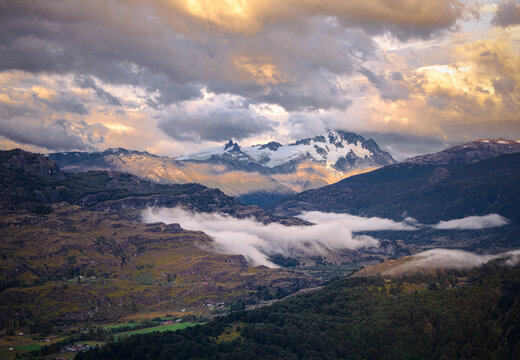 Dramatic sunset clouds over Cerro Castillo mountains Chile