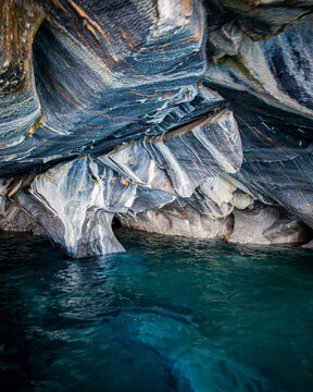 Inside the beautiful blue marble sea caves