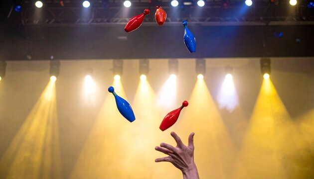 Dynamic aerial acrobatics performance in gymnasium spotlight.