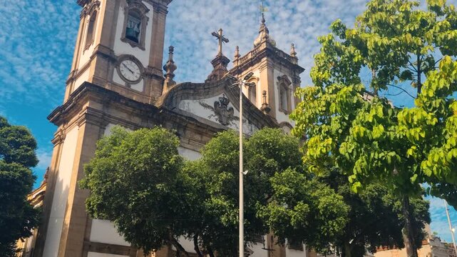 Elegant view of Igreja de S&atilde;o Francisco de Paula in Rio de Janeiro, a historic 19th-century Catholic church admired for its neoclassical fa&ccedil;ade on a sunny day