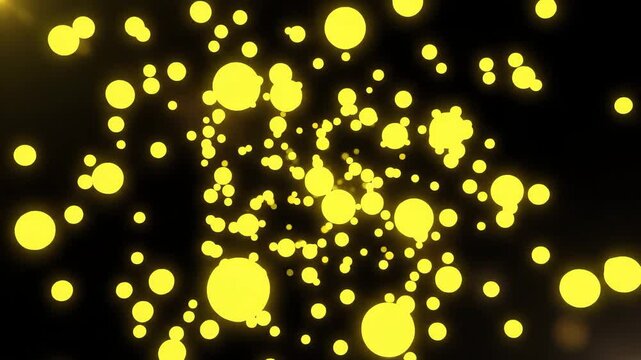 Particles Glowing Yellow on a Black Background Abstract Motion