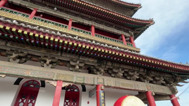 Xi'an, Shaanxi/China - May 29 2026: Vertical horizontal panning shot of the historic Xi'an Drum Tower, showcasing traditional Chinese wooden architecture and multi-eaved roof.