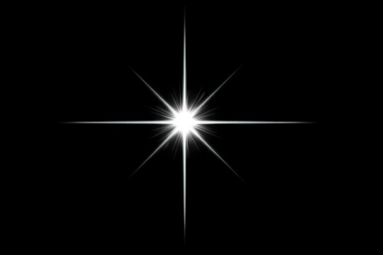 Brilliant white starburst against a deep black background.