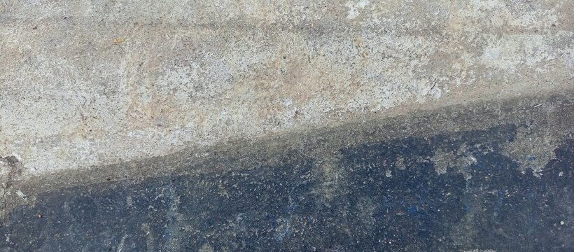 Two tone weathered concrete floor surface background
