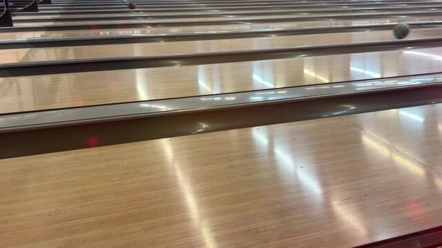 Bowling lane bumper lowering for children, close up bowling alley detail