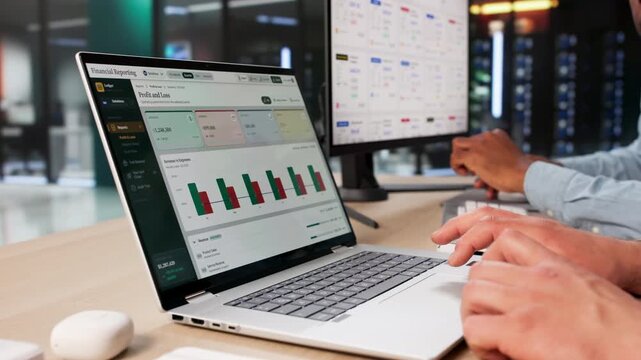 Accountant And Analyst Reviewing Year-end Financial Statements