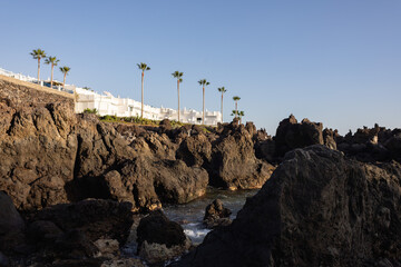 Fototapeta premium The rocky coastline at sunset