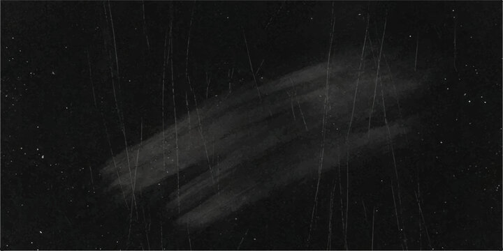 A blackboard surface with a chalk scribble, depicting a rough and weathered texture, perfect for grunge or educational themes.