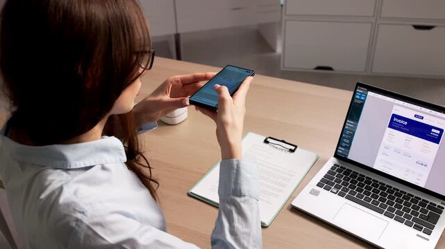 Person Holding A Smartphone Scanning A Document