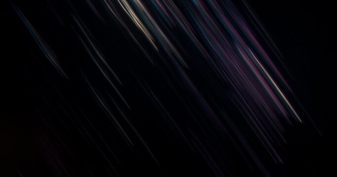 Dynamic abstract backgrounds with colorful light streaks, ideal for motion graphics and design projects. Perfect for creating stunning visual effects that captivate and enhance aesthetics