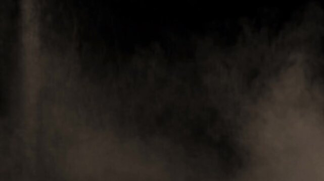 Dynamic Explosion of Colored Powder Against a Black Background.