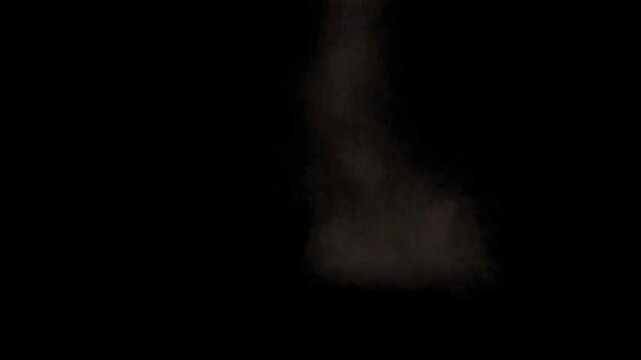 Realistic dust cloud explosion from an impact rising against a black background for visual effects.