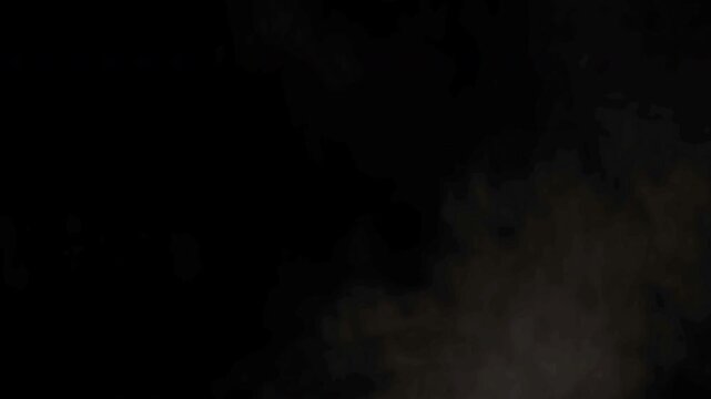 Realistic smoke plume rising and billowing on a black background for visual effects.