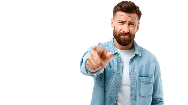 A person pointing straight ahead at the viewer with a serious expression. Isolated on white background.