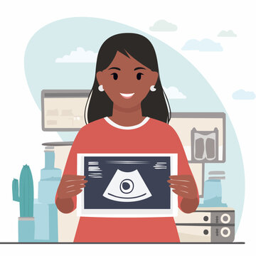 Woman holding ultrasound image