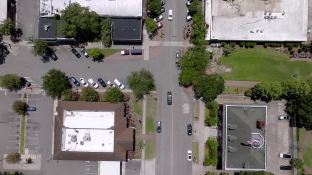 Traffic at an intersection in downtown Georgetown, South Carolina with drone video overhead.