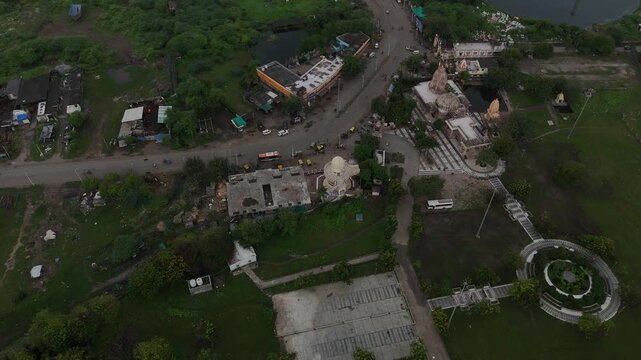 Aerial view of the sacred Bhalka Tirth Temple complex and sacred pond in Veraval, Gujarat.