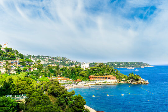 beautiful seascape of resort landscape on amazing sea coast with white baots green coasts and brisht sunset or sunrise cloudy sky of the colorful vacation summer landscape