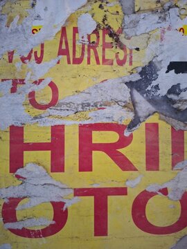 Torn and ripped street poster, grungy background, messy old paper collage