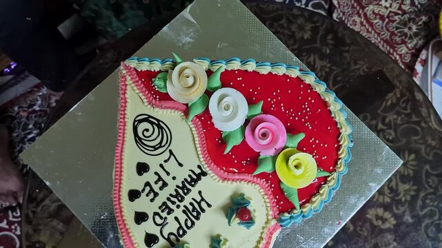 Closeup view of happy married life cake celebrating wedding and new journey together
