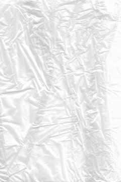 White crumpled plastic bag texture background. Clear cellophane wrap overlay effect for graphic design mockup.