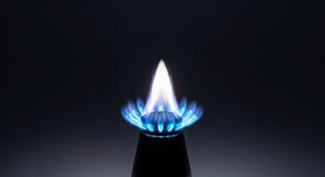 Intense blue flame combustion generated by a modern residential or industrial natural gas burner system providing efficient heating energy, cooking, burning, technology