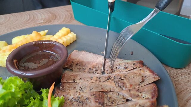 Gourmet steak house platter featuring Rib Eye, Sirloin, and Ribs Corn with a large double-meat burger. Cinematic camera movements from close-up to eagle eye view. Luxury dining experience. 4K.