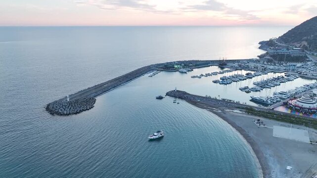 Beachside hotels overlooking shimmering sea waves and golden sands.