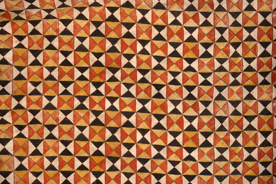 Hand drawn checkered pattern background with abstract dark squares. Seamless geometric art texture for design or backdrop.