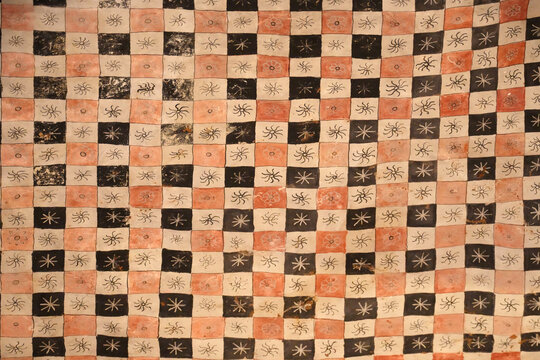 Hand drawn checkered pattern background with abstract dark squares. Seamless geometric art texture for design or backdrop.