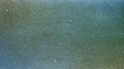 Fototapeta na wymiar Blank grained film strip texture background with heavy grain, dust and light leak