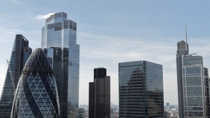 Obraz premium London Financial District Skyscrapers Under a Blue Sky