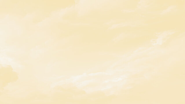 Soft white clouds in a pale yellow sky on a sunny day with a serene atmosphere and plenty of copy space