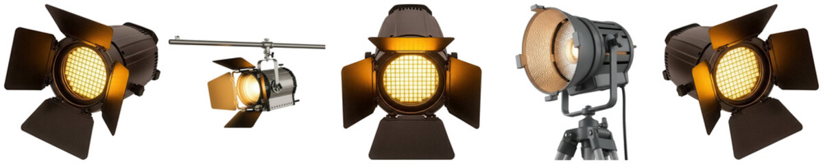 Professional studio lighting equipment with warm yellow glow, including spotlights and barn doors. © My