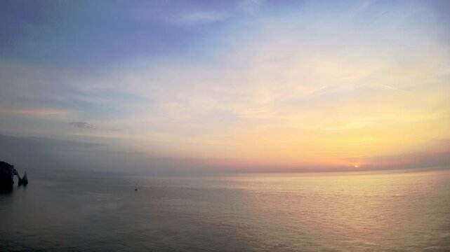 Panoramic Sunset View Panning Over the Ocean to the Iconic Chalk Cliffs of &Eacute;tretat, Normandy