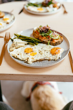 Fried Eggs Salmon Toast And Asparagus Served For Healthy Brunch