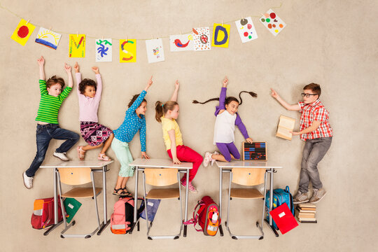 Teacher and school children in classroom