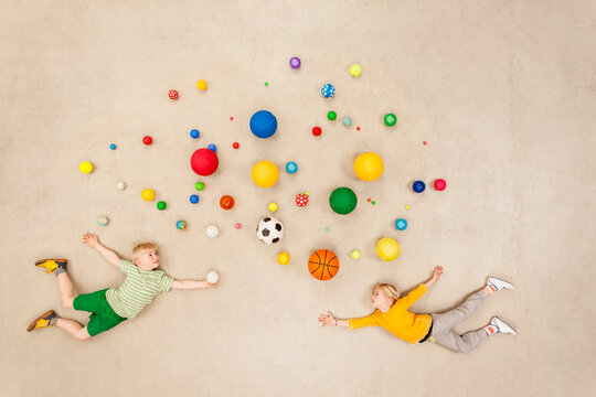 Children with colorful balls