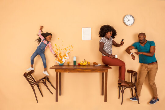 Stressed out family having breakfast in the kitchen