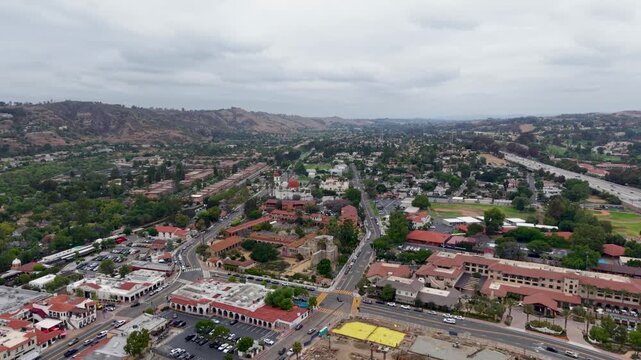 A breathtaking cinematic aerial view of Mission San Juan Capistrano. Sweeping shot of a California Landmark. A stunning high altitude view shot in 4k at 30fps.