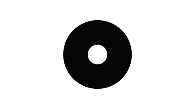 A black circle with a white center is shown clearly.