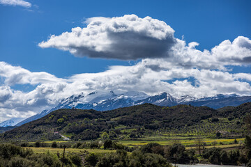 Obraz premium Clouds Over Mountain Village