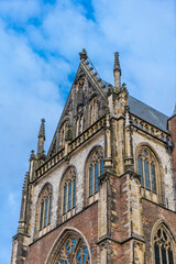 Obraz premium Exterior of tower of the Saint Bavo church in Haarlem, Noord-Holland, The Netherlands, Europe
