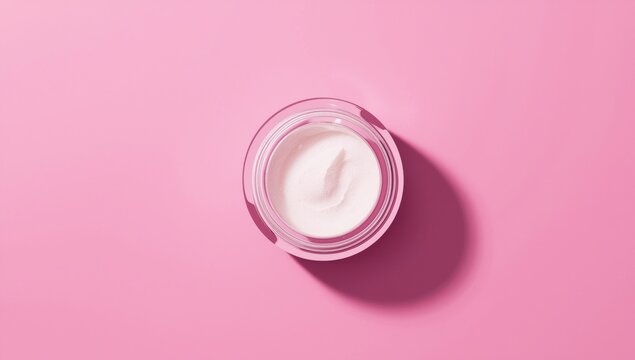 Container of hair removal sugaring paste shown on a sleek vibrant background