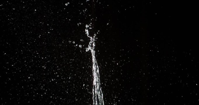 A mesmerizing water droplets splash effect occurs when a heavy object hits water, ideal for motion graphics, captivating films, and creating beautiful visuals that leave a lasting impression