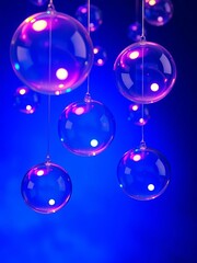 Obraz premium Hanging Glass Spheres with Neon Blue and Purple Lighting