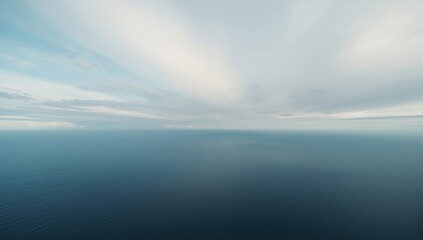 Fototapeta premium Grand still ocean panorama with gentle sky above